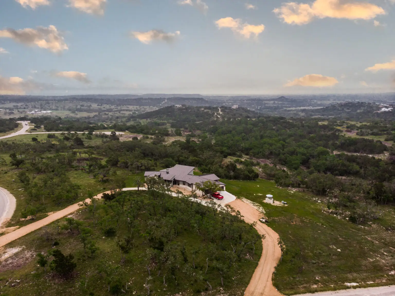 Ranch property — caliche drive through open Hill Country acreage